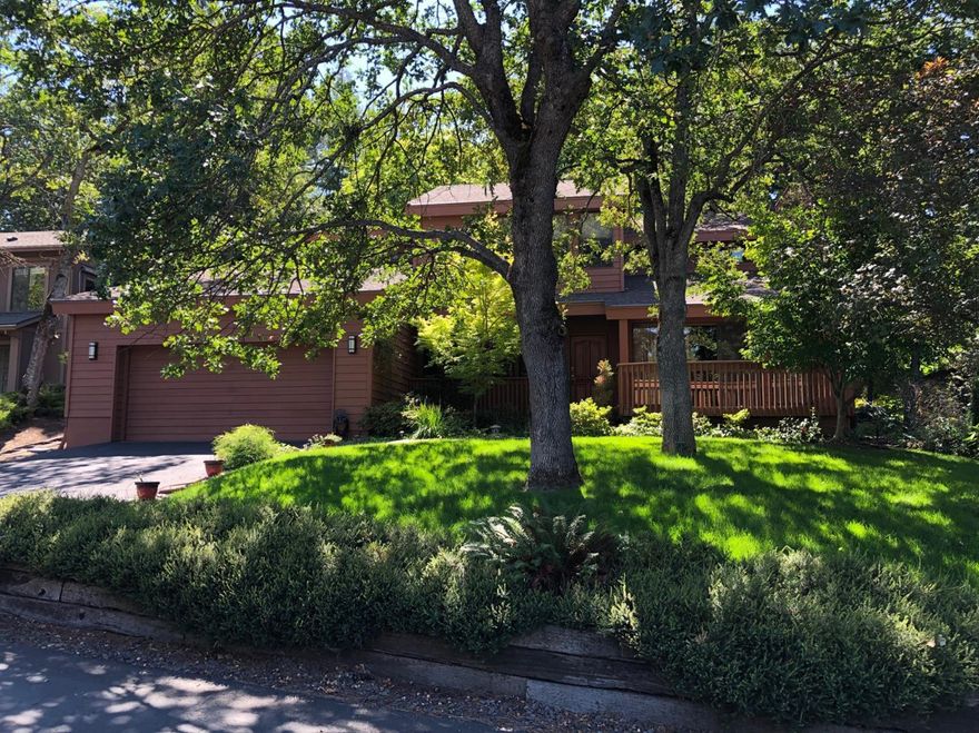 Inviting, delightful home located in the gated all age Sun Oaks Community. Two story home offers 3 upper level bedrooms, 2 1/2 baths, cozy office, bamboo floors, vaulted ceilings, skylights, formal living & family room. Spacious family room is open to gourmet kitchen w/ granite counter tops, custom pull-out cabinets, pantry, breakfast bar, gas cook top, oven, microwave, instant hot water, & trash compactor, new garbage disposal, newer dishwasher & refrigerator. Light & bright formal living room with gas marble surround fireplace. Master suite offers walk in closet, beautiful views & its own private deck. Updated master bath has double vanity, large soaking tub/shower & tile surround. Indoor laundry incl. W/D, upper cabinets & shelf. Tranquil front & back yard w/ oversized patio, front deck, extensive pergolas, mature trees, sprinklers. Ext. painted 2017. 2 car garage w/ loft for storage space. 2 clubhouses, 2 pools & tennis court. First American Home Warranty included!