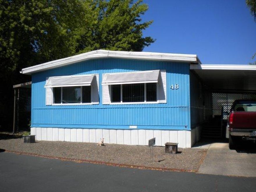 You will want to retire in this very well maintained mfg. home with a new energy package, new rubber roof, dbl pain windows, vapor barriers, re-leveled, has a newer energy efficient heat pump, hot water heater. Enjoy the great life in this quiet 55+ mfg. home community, close to shopping, hospitals and recreation. Nicely landscaped backyard with room for garden/w/automatic sprinklers.