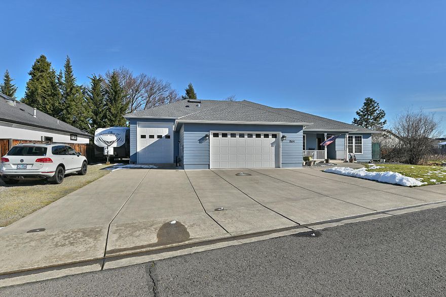 ** OPEN HOUSE, SUNDAY 4/13 FROM 12 TO 3**. 

Welcome to 864 Mendolia Way, a spacious 2,310-square-foot single-family home nestled in the heart of Central Point, Oregon. Built in 2001, this residence offers a harmonious blend of comfort and functionality.

Step inside to discover an open and bright layout featuring vaulted ceilings that enhance the sense of space. The kitchen is adorned with granite countertops, offering both style and practicality. The expansive master suite includes dual sinks and a generous walk-in closet equipped with built-ins for optimal storage.

The backyard is designed for privacy, making it an ideal spot for relaxation or entertaining guests. The substantial lot also provides additional parking options for all your toys as well as a two car attached garage and an RV garage!

Situated in a desirable neighborhood, this home combines convenience with tranquility, making it a must see home!