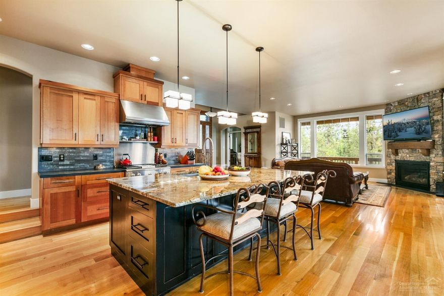 Custom Westside family home freshly remodeled in 2019 with detailed finishes throughout. This 5 bedroom 4 bath home offers a wonderful layout for family and entertaining. Step into this inviting home to find the great room presenting grand views from each window! Gourmet kitchen features high end appliances, over 50 feet of granite slab countertops, breakfast bar, pantry. Main level offers large master bedroom large bonus/media room, large office with Custom Alder Wood Desk and Cabinetry, guest suite, bathroom, finished details throughout. Upstairs includes remodeled large bonus room with larger window added views of Smith rock and Jefferson. En-Suite and additional bedrooms with Custom Alder Wood Shelving and large closet space. Situated on .48 acre lot beautifully landscaped. Luxurious Outdoor Kitchen with slab granite, custom BBQ, Smoker/Oven provides ample room for entertaining/seating under Pergola with stone pillar finish. Custom speaker system throughout. Large 3 car garage.