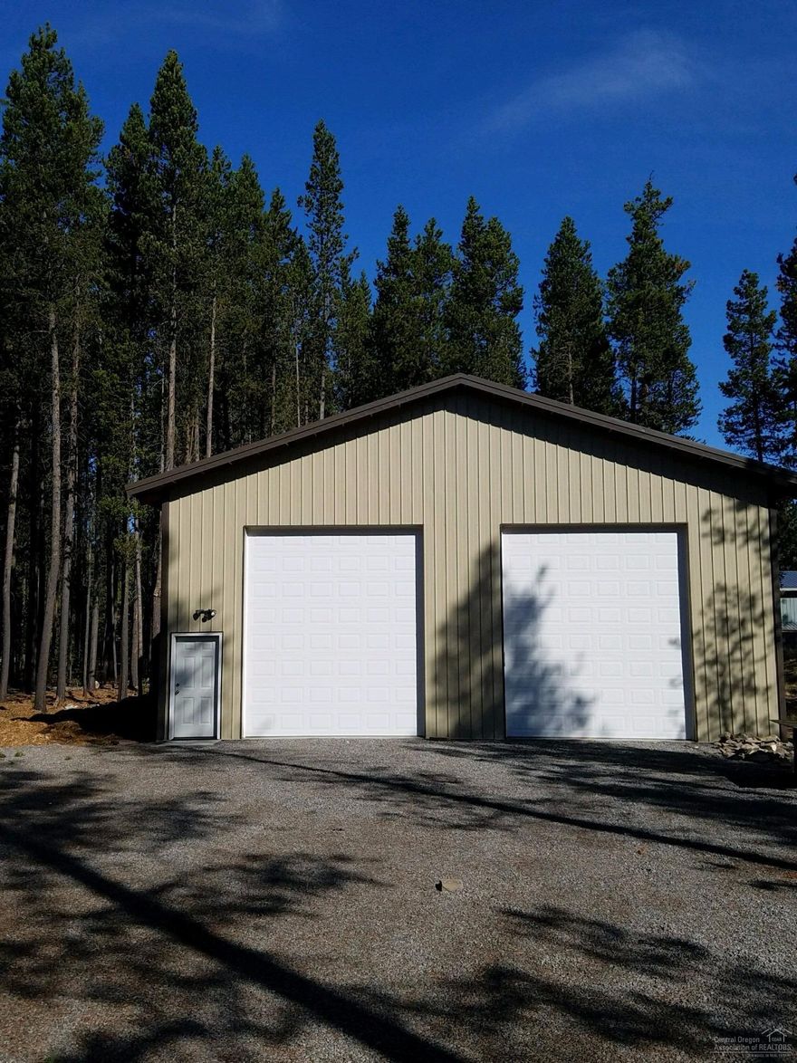 Recreation lot with newer 40x48x16 shop for all your toys. 2-12x14 roll up doors (1 has automatic opener)with 1 man door. Ceiling insulated, concrete floors, and power.
