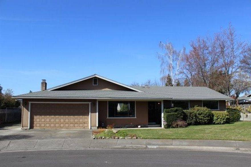 Single-family home in East Medford on a quiet, cul-de-sac street in the desirable Lone Pine School District. Dining room, living room & separate family room with brick fireplace. Two car garage with plenty of storage cabinets & workbench. Paved RV/Boat parking on side of driveway. Property is centrally located close to schools, medical facilities & other amenities.