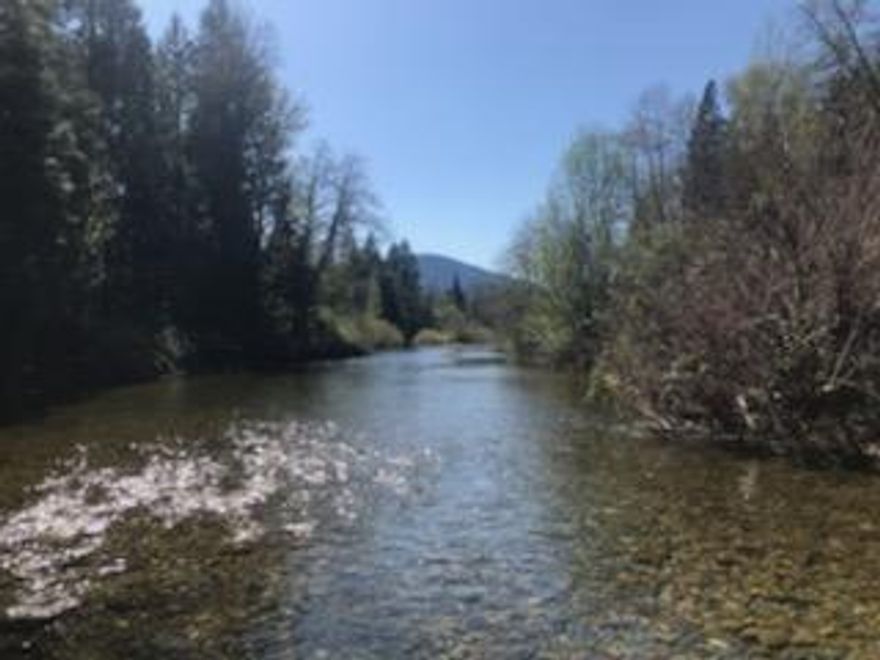 5 Acres on Deer Creek, 1.8 miles to Hwy 1999! COMFORTABLE AND CLEAN 2-story Craftsman style home on 600+ ft of Deer Creek frontage with your very own ''swimming hole'', sunny acreage and privacy.
Inside, there's plenty of room with 12 X 22' loft , w/half bath and abundant storage; spacious & sunny Eat-In kitchen;  large living rm w/wood stove and big windows to enjoy the view.
Master bedroom has sliding doors out to a private deck, a full bathroom w/ tub and a generous walk-in closet.  Adjacent to the master is a 3rd bedroom/nursery with its own closet.
2-car detached garage w/upgraded 60 Amp power and nearly new Infrared sauna installed. (Equipped with sound& lighting).
NEW AMENITIES ADDED TO HOME & PROPERTY SINCE  JANUARY 2017:
Septic System, 96' ft water well/pump, Whole House Water Filtration system,
Vermont Castings Wood stove (w/ new chimney & piping), Hot Water Heater, Dishwasher, and Reverse Osmosis system in kitchen. 
30 year composition roof and new gutters installed 2018!