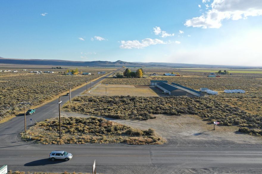 Excellent high profile, high visibility commercial development opportunity in the heart of the expanding Christmas Valley! This 1.42 acre, commercial flat corner lot is set on prime Christmas Valley Highway frontage at a busy intersection with a gas station and market. Bring your creative business ideas! Domestic water and power available at the street. Lot is partially fenced. There are many businesses in town along with a 9 hole golf course. Popular nearby attractions that brings adventure seekers, off-road riders and tourists to the area; Fort Rock, Christmas Valley sand dunes, hot springs, Crack-in-the-Ground, numerous lakes to fish and more. Invest now in this growing community and your future! Buyer to perform their own due diligence on commercial, land use and conditional use permits within Lake County.