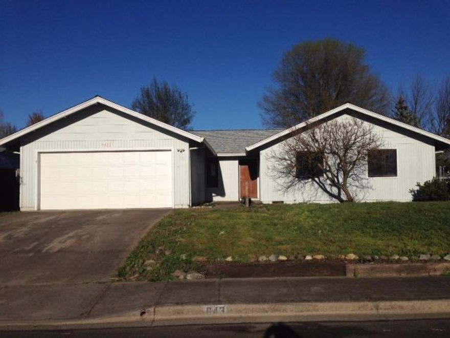 Nice 3 bdrm 2 bath home with lots of potential. Covered patio with a huge backyard and mature landscaping. Cute kitchen with small breakfast nook area, plus large formal dining area. Rock fireplace adds character and charm to this spacious living room. 2 car garage with built-in work benches.