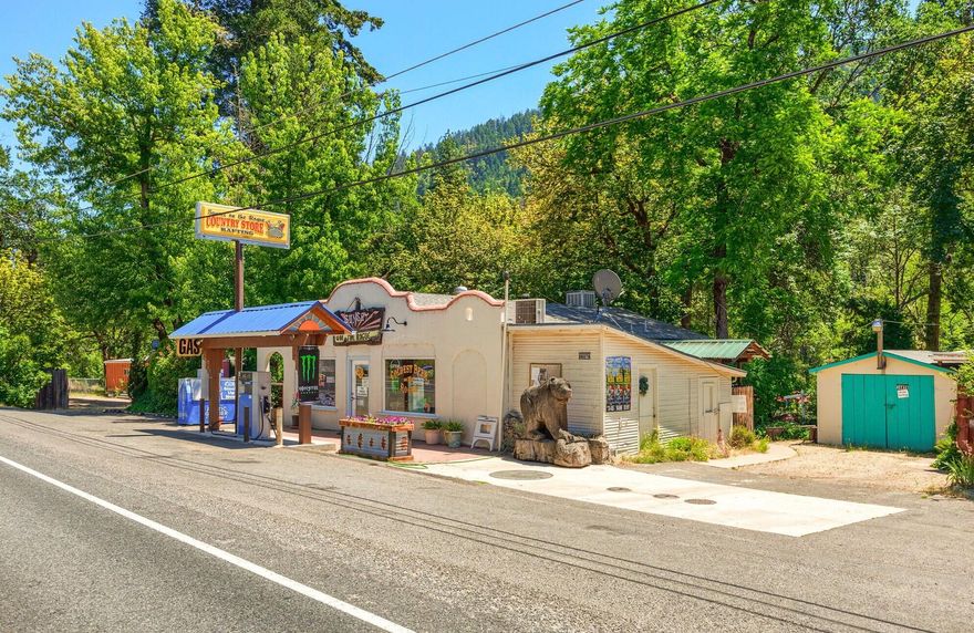 This property is a wonderful find! It is a riverfront property with a convenience store, one pump gas station, manager's home, cabin, vacation rental, and river rafting rentals, all rolled into one! Cash and credit both. The original structure was built in 1928, and the present owners have been operating ''Sunset on the Rogue'' for the past 33 years. It is a wonderful spot to rent raft, picnic, have a hamburger from the market, or stay in a vacation rental. It is close to Lost Creek Lake, on the way to Crater Lake, and has world-class fishing right off the bank. The convenience store is adjacent to the main manager/owner's home. It has been updated and is very comfortable with hardwood floors, and an open floorplan. One of a kind riverfront property on a desirable steelhead fishing location. Your chance to own a special Southern Oregon riverfront retreat.