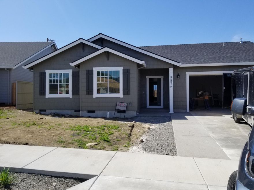 New home by Gary Ray in one of the newest developments in East Medford, the horse arena subdivision. Tucked peacefully in a country setting with mountain views this home will feature 3 beds/ 2 baths 1980 square feet and large kitchen with tons of custom built cabinetry. This open and spacious floor plan will feature hardwood, granite, custom fireplace mantle and much more.