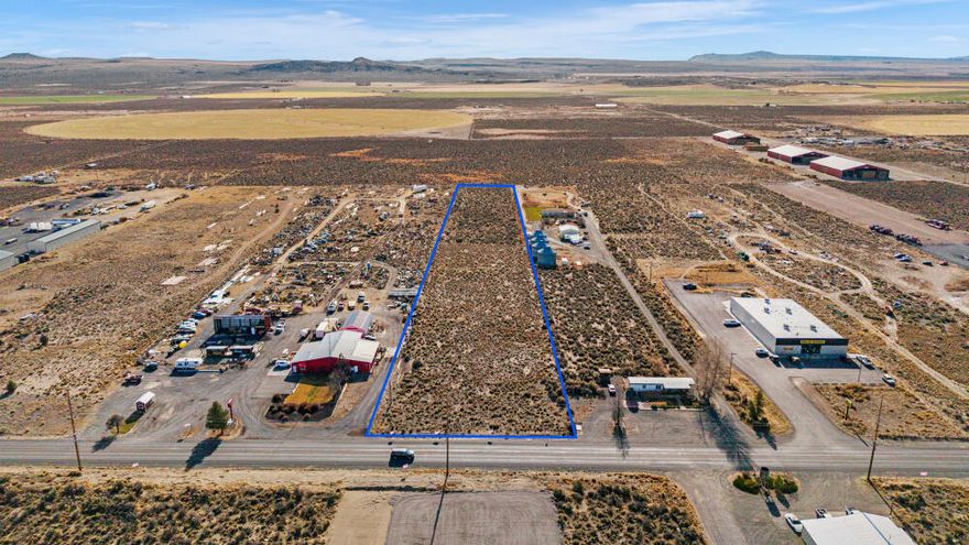 Rare 4.92-acre commercial parcel in Christmas Valley, Oregon, with 165' of highway frontage and excellent visibility. Larger than most available parcels along the main commercial corridor, this flat, buildable site is ideal for retail, service, or mixed-use development. Limited commercial inventory makes it an attractive opportunity for investors and business owners seeking high-traffic exposure.
Power is nearby, and county zoning allows a variety of commercial uses. With strong potential for development in an affordable, expanding desert community near tourism and renewable energy projects, this property stands out as a strategic investment in Central Oregon.