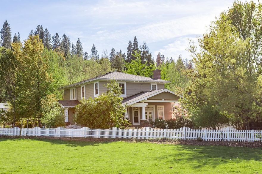 Beautiful Pagnini built home located in desirable downtown Jacksonville. Situated on a large lot facing green pastures, the home has a wonderful craftsman style and appeal. This home has three bedrooms, two and a half bathrooms, 2132 square feet, with hardwood floors, gorgeous granite counters, and vaulted ceilings. There is 800 sq ft of covered deck that is perfect for entertaining, and the large gourmet kitchen has wonderful French doors that lead out to the east facing patio. The back deck leads out to the koi pond, gazebo and the swim spa. There is great attention to detail in the home, with beautiful finishes like 10 inch crown molding, multi-panel transom windows in the kitchen, and overall charm of the home. It is a stunning home, with privacy, it's own little mini orchard of 13 fruit trees, plus views of the hills and vineyards A must see property!