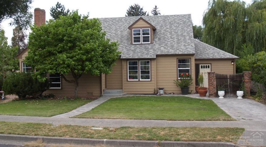 Beautiful 3305 Sq Ft vintage style family home in desirable SW Redmond. Many updates and upgrades including new Hardi plank siding & paint. Granite kitchen counter & new floor in kitchen & family room. Original birds eye maple in living room. Nice mature landscaping, 3 car covered parking plus 2 car garage