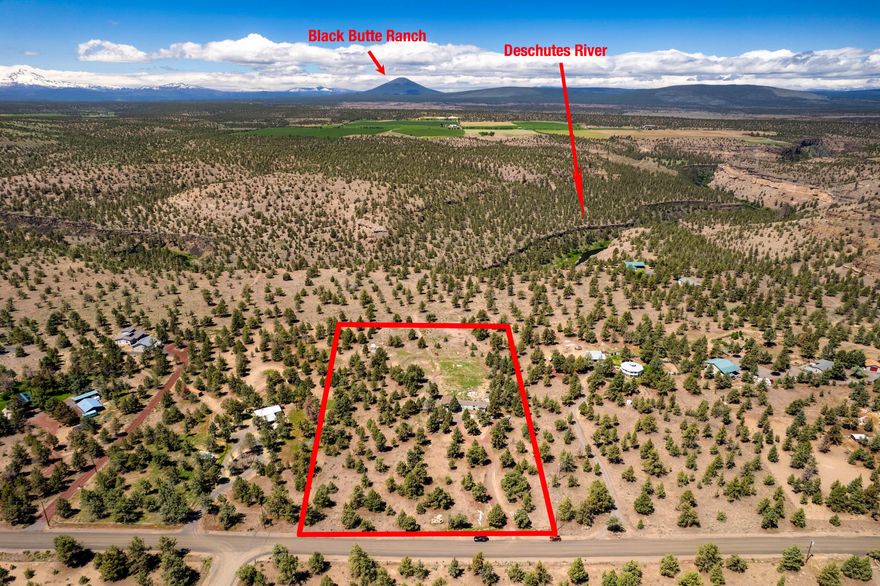 Seller-carry option available. Truly special property. This flat, 5+ acre property backs up to public land; take a short meander off the back of the lot to see the Deschutes River canyon with breathtaking views and cliffs that overlook the one and only Steelhead Falls. Mountain views are also included! You will be inspired to hike, horseback ride or find a lively fishing hole right off the back of the property!!  There is also a two-car garage! RV hookup and dump are on-site. For those that are interested in developing a special property, this is not to be missed! Crooked River Ranch is an active community with a strong network of social groups and hobbyists. HOA membership gives access to community pool, riding arena and discounted rates at our scenic and fun golf course!