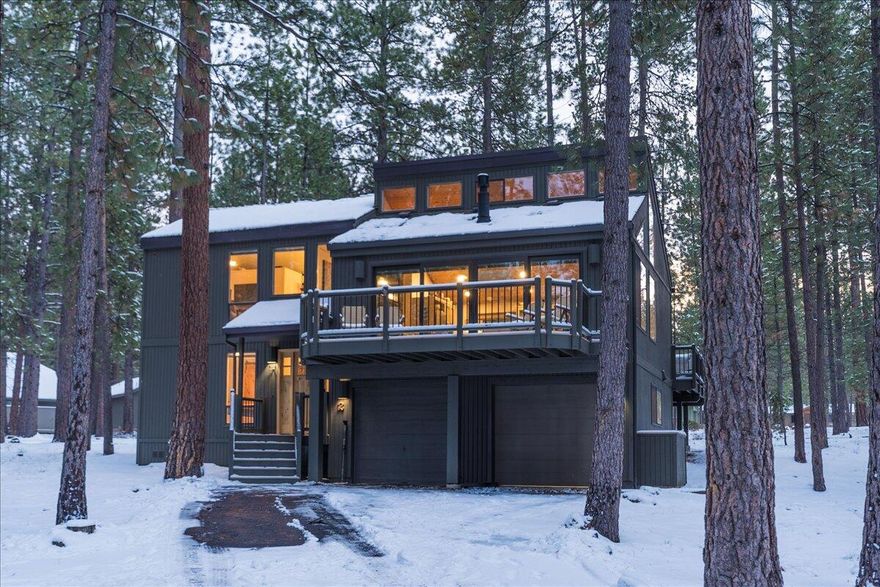 This charming mountain cabin is a vacation treat, both inside & out. Beautifully renovated resort cabin offers Sunriver vibes w/ all the modern conveniences. Interior features vaulted cedar ceilings & skylights providing lots of light in the open great room. Enjoy a stacked stone gas fireplace on cool days. Kitchen offers granite counters, modern appliances & plenty of prep space. Hickory hardwood flooring flows through living areas & the custom sectional offers plenty of seating! Bedrooms are nicely separated from the common living space: primary bedroom suite is upstairs & guest quarters & bathroom downstairs from the living area. Enjoy an outstanding view from the great room & open up the 16 Ft Pella sliding door & take the party outside on one of the 3 large decks. Soak in the hot tub or relax in the sauna. Cul-de-sac location w/ 2-car garage & 2 add'l paved parking spaces. Convenient location near the Village & SHARC, plus easy access to all the amenities.