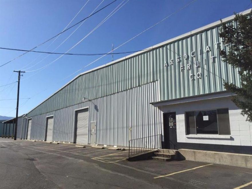 Approx. 82,375 sf of manufacturing/warehouse bldgs with heavy power. Former Associated Fruit Packing & Cold storage facility in Phoenix, Oregon. The property consists of an ~54,625 sf high-ceiling industrial packing w/some cold storage on ~1.65 ac. Located right along the CORP Railroad with a rail spur and dock area. Not included in the sales price is an additional ~27,750 sf of cold storage area in 3 separate buildings situated on ~1.45 ac which is leased from the Railroad on a year-to-year rental agreement. Sellers are willing to assign this lease. The property is also available for lease in various configurations. Manufacturing/warehouse spaces ranging from 7,000-82,375 sf @ $0.30/sf/mo. Gross; or cold storage spaces ranging from 7,000-46,300 sf @ $0.85/sf/mo. Gross.