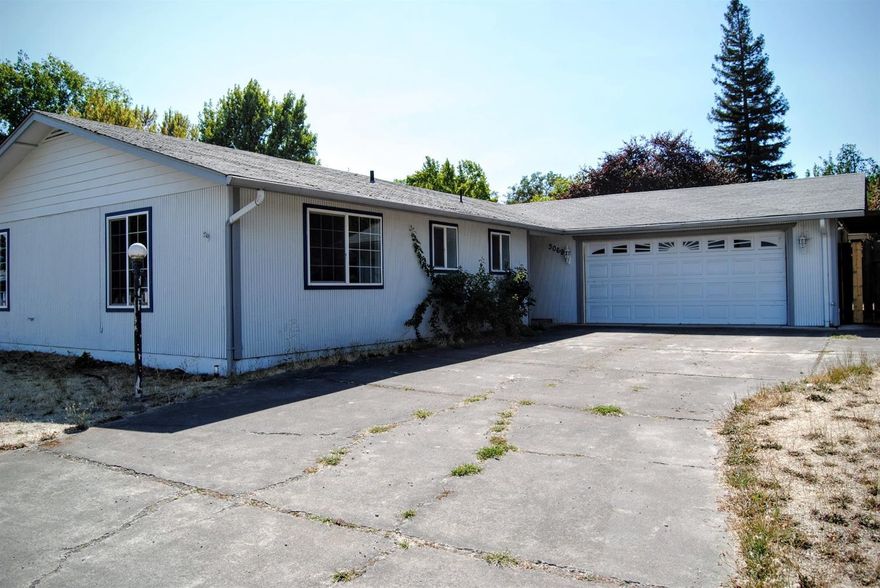 Remodeled single-story 3-bedroom/2-bath home with an open floor plan in a convenient NW Medford neighborhood, close to schools, shopping, and freeway access. Recent work includes new carpet in living room, hallway, and all bedrooms, new vinyl in entry and both baths, plus new vanities and faucets in both baths. There is a new furnace and A/C unit, plus all-new ducting throughout the house. The attached 2-car garage includes an additional carport, plus more off-street parking for 2-4 cars. Must see!
