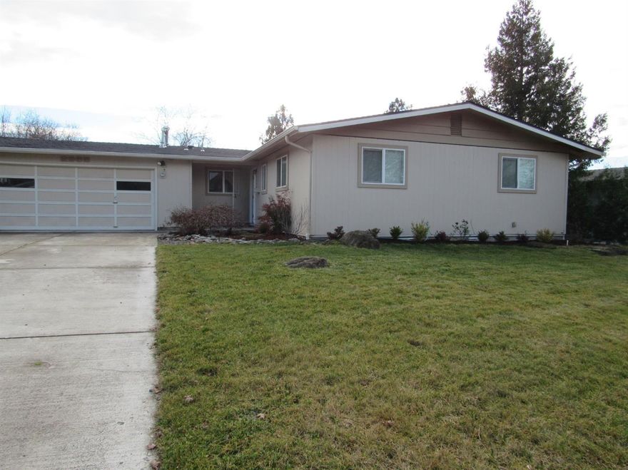 Location is huge! Hoover Elementary, near Asante Medical, SE Medford. This well cared for home is simple, affordable and has key updates which include new roof and new vinyl windows throughout. There are original oak floors through most of the home along with gas heat and gas water heater. The family room is a lovely addition and adds a wonderful room for family gatherings. The living room is bright and airy and features a beautiful brick fireplace. Out back is a very large, fenced backyard with sprinkler system. There is room for RV parking out front.