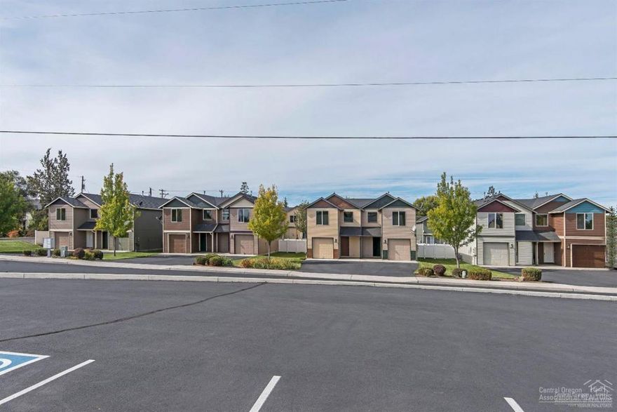 CoHo Crossing Townhomes! Great rooms feature stacked stone fireplace & sliding doors to vinyl fenced backyard & patio. Quartz countertops w/stone & glass blacksplash, all new stainless steel appliances, breakfast bar, 1/2 bath & laminate flooring features of main level. Spacious upper level master bedroom/bath is separated from other bedrooms. AND upstairs utility space makes laundry easy. Single attached garage. Affordable w/no HOA!