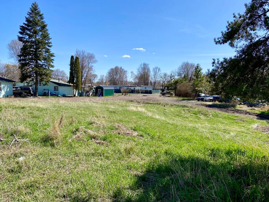 Zoned ''HR: High Density Residential'' - Level lot with utilities at the street (City water/sewer, power, natural gas) and ready for development - Multi-family uses are permitted outright. See the uploaded sheet for Permitted Uses and those allowed with a Conditional Use Permit. Location is tucked away from busy traffic and close to town and shopping. Buyers to perform their due diligence in regards to intended use and utilities.