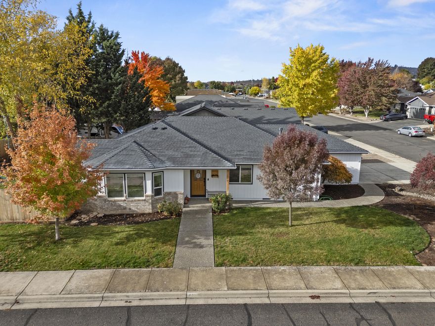 Well-kept home in the desirable Butte Crest subdivision, close to schools. This home features tasteful updates and a spacious open living area with vaulted ceilings. The kitchen has durable vinyl plank flooring, light and bright cabinets with plenty of storage space. The primary suite includes a vaulted ceiling, walk-in closet and a remodeled bathroom with a large tile shower and double vanities. The sliding glass door from the living room leads to a covered concrete patio and a backyard that is perfect for outdoor enjoyment. Situated on an oversized corner lot, you will find privacy fencing and an extensive RV parking area with 50-amp power and waste disposal, along with a storage shed. Call today to schedule your tour of this stunning home.