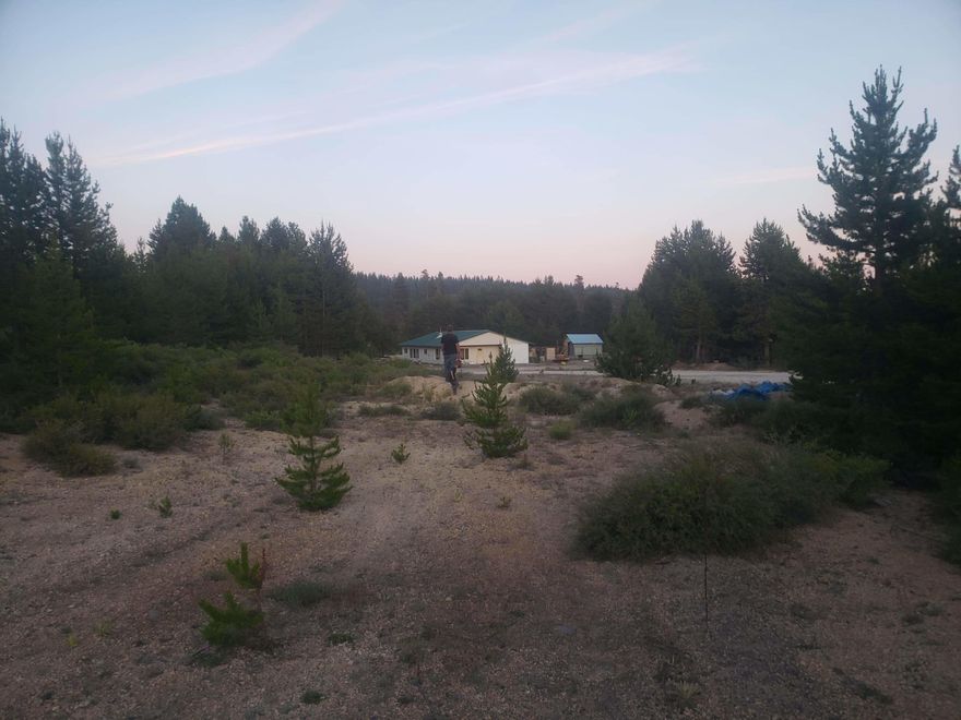 74+ acres offers many different possibilities from possible RV park, pumice sales, mushroom picker rentals, quad riding, dirt bike training, hunting etc. Property is being sold AS IS.  The 4 bedroom home has huge possibilities. This home needs to be finished but has a good start on a super nice home. Just need your imagination and some needed repairs.  The seller will locate and pump septic.  Buyer to do their own due diligence regarding septic system and all permits, well along with any permits, property boundaries, along with any and all permits for property.