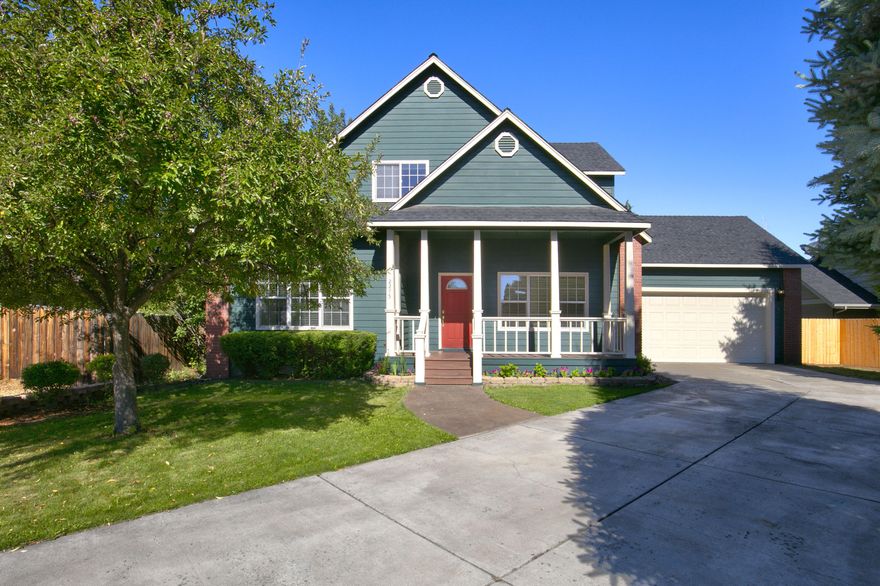 Beautiful two-story home sits on an oversized lot at the end of the cul-de-sac. Primary bedroom on the main floor with three additional large bedrooms upstairs. Hardwood floors throughout 1st level. Gas fireplace with built in entertainment center is the perfect gathering place. Conveniently located near shopping, restaurants, medical facilities and schools.