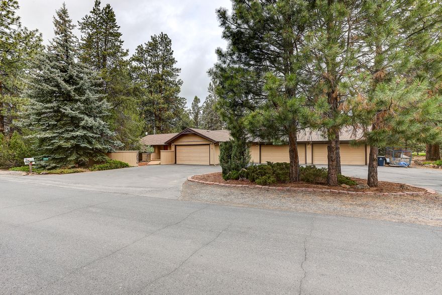 Retreat to your private oasis away from the hustle and bustle of town. Corner lot on over half an acre in a park like setting with space galore for all of your vehicles or toys.
Charming and full of light with 11 skylights, formal dining...endless possibilities with all of the rooms.
One garage is heated with 1,161 sq ft and the other is 440 sq ft. 
Beautifully landscaped, circular driveway with RV parking on the side you must see for yourself!

*Fresh interior paint and new carpet!
*Home back on the market at no fault to seller