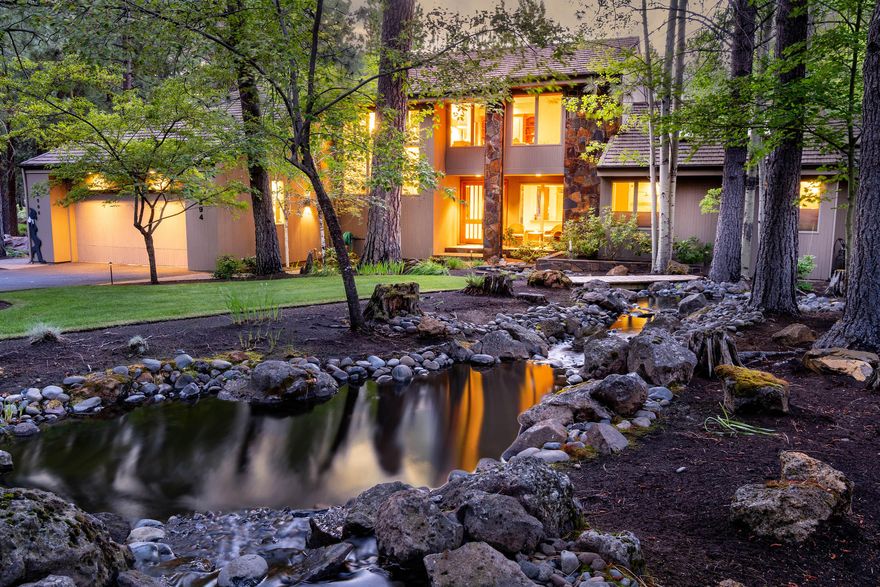 Timeless elegance and style are yours in this striking Black Butte home. An outstanding floor plan, top quality materials, and stunning use of windows, create a feeling of ''welcome home'' the minute you enter. You'll appreciate a relaxed, open floor plan featuring Montana Bronze slate fireplace, floor to ceiling windows in the great room, built-ins and French doors opening to the deck. A chef's kitchen boasts top-of-the-line appliances, walk-in pantry, and dine-in island. The main level master has it all; extensive windows, beautiful view, reading area, walk-in closet, and ensuite bath. Upstairs you'll find two bedrooms with ensuite bathrooms, reading/media space and large flex room with storage. Included in the total square feet of this home is a lower level with 700+ square feet for working out, media, storage, and full bath. Take pleasure in gracious outdoor living and entertaining with both an extensive deck and beautifully landscaped yard with stunning water feature.