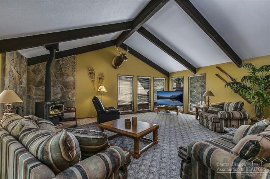 Well maintained home located in a cul-de-sac close to all the Sunriver amenities. You'll love the generous spaces designed to accommodate large groups. 3 bedrooms + Family Room, 2.5 Baths. Family Room is currently being used as a bunk room. Open Vaulted great room w/exposed beams & woodstove. Oversized Master features fireplace and double closets. Large deck and hot tub. 2 Furnaces. 2 Car Attached Garage.