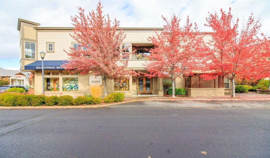 Beautiful mixed use Commercial/Residential building located on the corner of 4th and A street in the heart of the Historic Railroad District. Built in 2000 by its original owners, this property offers one of the most sought after and desirable locations in Ashland. Close proximity to much of downtown,easy access to the bike path,parks and OSF. A very nice turn-key income property with E-1 Zoning allowing for a variety of uses. Upper level features three lovely residential units with high ceilings,skylights,porches and more. Ground floor has four commercial spaces(currently situated as three),which include a bicycle shop, financial investment firm, and chiropractic office. Impeccably maintained throughout,recent improvements include all new windows,exterior paint,and roof. With solid long term commercial and residential tenants, this building earns over $125,000 gross annually. Owners may consider carrying half with acceptable offer.