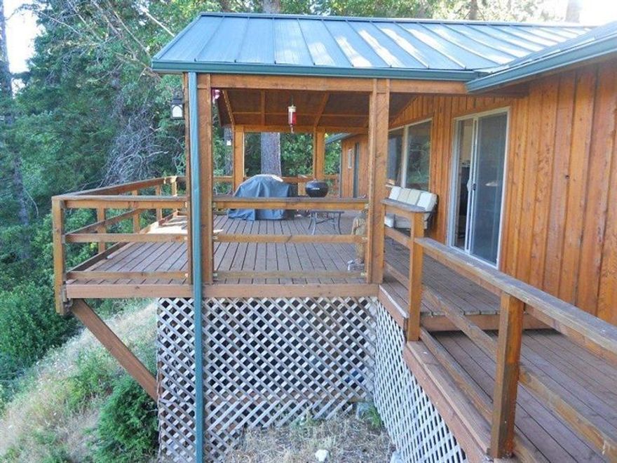 Agness,Oregon on the Rogue! This is a 2 bedroom 1 bath home with great decks overlooking the Rogue River! Indoor utilities, guest house with sitting room and bedroom and bath, caretakers quarters with bedroom/bath and sitting room. Furnishings come with the property and appliances.