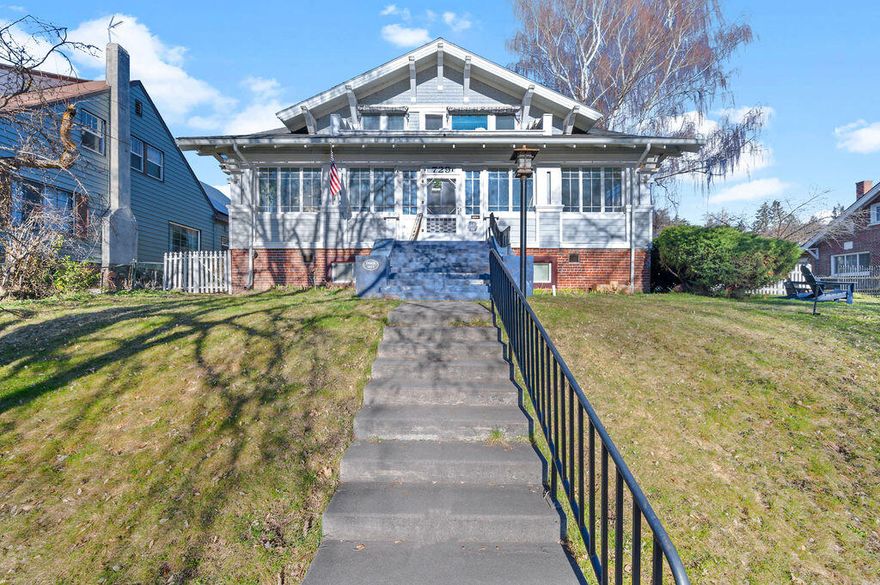 Welcome to this beautiful, timeless, and elegant Craftsman home located in the charming Pacific Terrace area. This impressive single-family residence sits on a spacious .37acre lot and boasts a generous 5,524 square feet of comfortable living space, featuring 4 bedrooms, 3.5 bathrooms, and ample parking for up to 8 vehicles. Designated parking up to 6 vehicles and a 2 car 24x30 finished and heated gym.  As you step inside this classic beauty, you'll be greeted by gleaming hardwood floors and a roomy, flowing floor plan that seamlessly connects each living area. The main level offers a large living room with soaring 9-foot ceilings, perfect for gathering.  A bright enclosed front porch and airy sunroom provide additional spaces for relaxation and enjoyment. The heart of this home is undoubtedly the stunning gourmet kitchen, which showcases gorgeous granite countertops, sleek stainless steel GE Monogram appliances, a gas cooktop, and two wall ovens. Heated tile