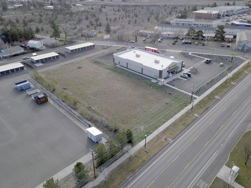 Awesome Commercial Investment Opportunity!!
Located on HWY 97 and 26, between the Dollar General and Abby's Pizza, and across the street from the Dollar Tree and in The Madras Urban Renewal Zone. This property presents an array of options for any Entrepreneur or Investor. Retail, professional. Restaurant, Single or Multi-Tenant project or ???? Property access is off of Brush ln. Contact City of Madras and DOT concerning access off of HWY 97 and 26.