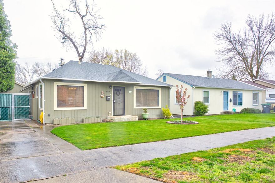 Charming cottage lovingly cared for. Beautifully landscaped. Hard wood floors in living room. Stainless steel appliances The bedrooms are both nicely sized. Lots of storage. Garden boxes in back yard. Newer roof, gutters, facia boards, outside paint, newer fence, alley access to back yard. This home is immaculate and move in ready.