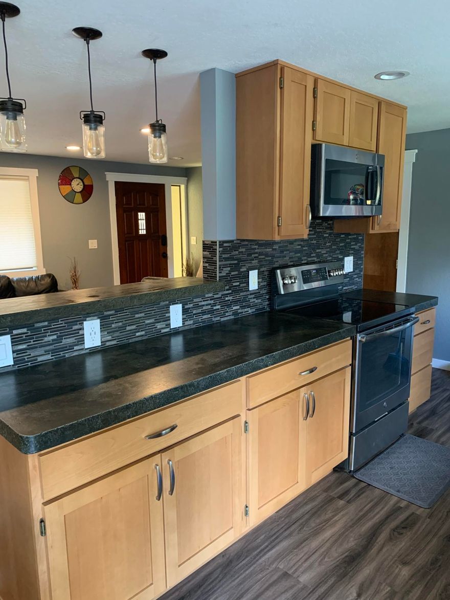 Back on the Market at no fault to the property! This Listing won't last long with all the upgrades this home has to offer! This home is just a few minutes from the town of Gold Hill and I5 with a country feel. Great sized lot at .50 acres with RV parking and sewer hookups. Large fenced back yard. Short walking distance to the Rogue River and the Gold Hill Sports Park.  Updated Kitchen with concrete countertops, new flooring throughout, new paint on the interior, new septic, new light fixtures and a certified wood stove.  Master bath features a walk in shower with a blue-tooth exhaust fan. All listed updates have been within the last two years. Come and see all the wonderful features of this updated home!