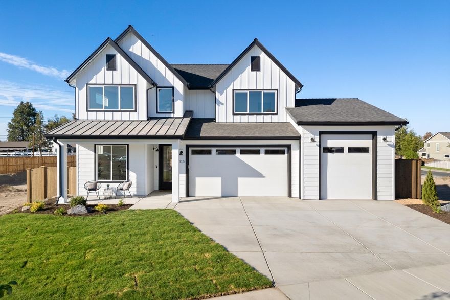 GRAND OPENING OPEN HOUSE! Welcome to Starview, where modern design meets functional living. The main level features an open-concept great room with cozy gas fireplace, chef's kitchen with spacious island, quartz counters, stainless appliances, and versatile bedroom or office. Step out to the covered deck overlooking the fully landscaped and fenced backyard-perfect for entertaining or relaxing. The three-car garage with RV bay adds exceptional storage and flexibility. Upstairs, the luxurious primary suite offers dual vanities, a tiled shower, soaking tub, and two walk-in closets. Two additional bedrooms, full bath with dual vanities, large bonus room/5th bedroom with closet, and convenient utility room complete the upper level. Ideally located near Hwy 97, with easy access to Bend, and Redmond's dining, shopping, schools and parks, this home blends comfort, style, and convenience for today's lifestyle.