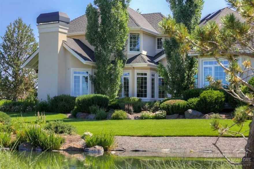 Expansive Cascade mtn. views from traditional estate on 18+ acres bordering BLM. Light-filled home features an open kitchen w/high-end S/S appliances, office, floor-to-ceiling masonry wood-burning fireplace, coffered ceilings, floating staircase & media room. Ideal for outdoor entertaining, exterior boasts incredible landscaping, Trex decks, a pond, pasture w/irrigation & full field fencing. Outbuildings include: 5-stall barn w/tack room & arena, 5-bay RV garage/shop, care taker's studio & pump house.