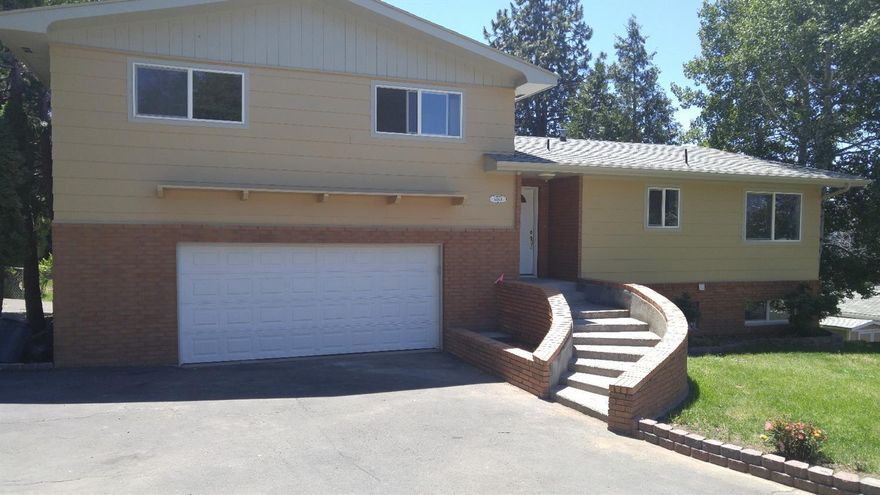 Stunning Home!! Motivated Sellers! Property just reduced! Private setting on a corner lot. Expansive 4 bedroom plus extra room for any need. 3 full bathrooms. Updated extremely well from top to bottom. The exquisite kitchen with its granite counter tops, new cabinets, new appliances, recessed lighting make this home very bright and homey with the large picture windows to look out of. One fireplace from basement family room to upstairs living room. Upstairs has the gas insert in for lovely winter nights. Large decks on both floors to have bbq's. Fenced back yard and circular driveway. Please call for an appointment. Tenant living in basement area!