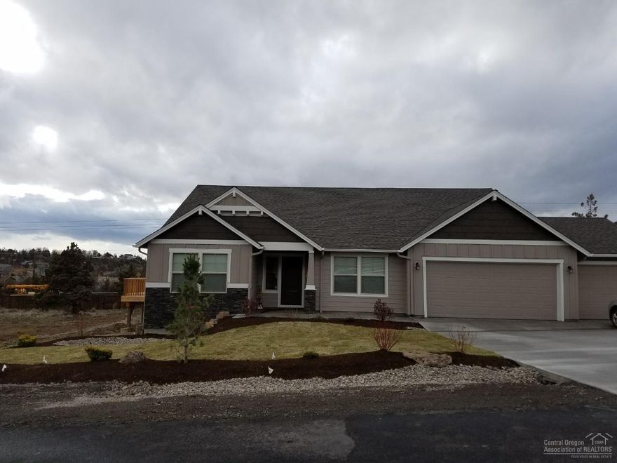 MonteVista Homes presents the Crimson Custom floor plan on a half acre in Terrebonne's desirable Angus Acres neighborhood! This home features a great, open floor plan, vaulted family room ceilings, large custom kitchen with an expansive island, and an additional front dining or living room. The kitchen has custom cabinetry, granite counters and stainless steel Whirlpool appliances. The master bedroom leads into a grand master bath with soaking tub and separate tile shower.