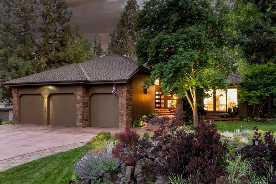 This is a must see home designed by architect Neal Huston. Nothing has been spared in the upgrades that this stunning home offers. Nestled in the mature trees, the home offers a primary suite on the main level, for utmost privacy 2 guest rooms upstairs with en suites. The custom kitchen is an entertainer's dream, with a large island, wet bar, Sub Zero frig and Decor double ovens. The main level office space has custom cabinetry and a murphy bed. The dining and family room boasts the warmth of a fireplace. The wood beams throughout highlights this architectural masterpiece. The main level office space has custom built in cabinetry and a murphy bed. The home provides privacy and blends the indoors with the outdoors. Extensive decking and patio area surrounded by mature trees & lush landscape provide utmost tranquility. The primary suite has a private deck and covered dog run.   Located in a gated community with a pool, clubhouse, pickleball/tennis courts and acres of walking paths.