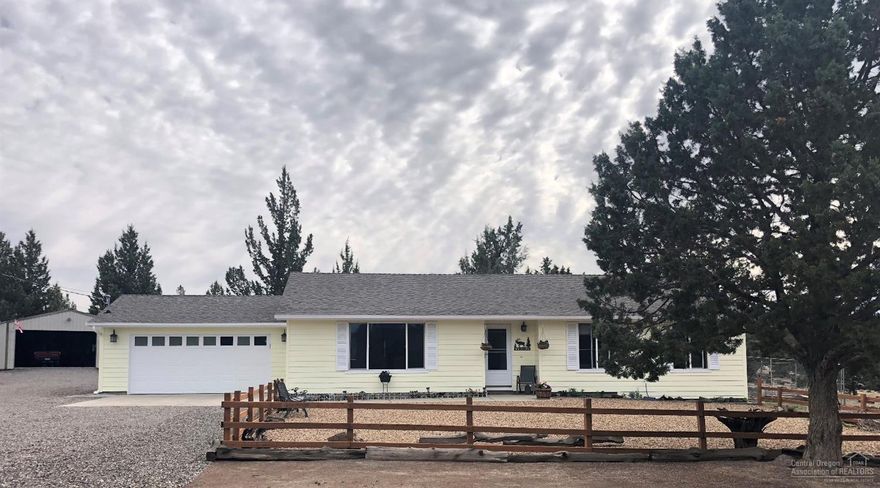 Wonderful single level home with shop on just under 5 acres! Recent updates include new exterior paint in 2017, laminate flooring, new SS appliances, quartz counter tops, refinished kitchen cabinets, & more! Two formal living room spaces, ceiling fans in every room, lots of windows & solar tubes for natural light. Fully fenced back yard includes new underground sprinkler system, raised bed gardens, mature trees w/ tree house & large deck for evening relaxation. Thoughtfully designed walking paths carved with lava rock around property, fenced & cross fenced for horses, 864 sq ft shop w/ 220 amp circular, circular drive. RV parking & full hookups. Peek-a-boo mountain views! Close to BLM, river, and town!