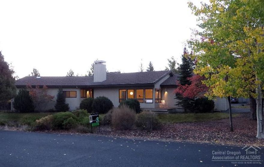 A wonderful home on Bend's westside. Designed by an engineer, the interior spaces are gracious, airy and flow easily from room to room. Wake up and enjoy the sunshine and sounds of nature in this custom built single story home. Beautiful hardwood floors in the entry, kitchen, dining. Large family room with sunny windows & wood burning fireplace. Spacious laundry room with utility sink. 3-car garage with attic, work bench & cabinets. Neighborhood amenities: tennis courts, pool, trails, park & river access.