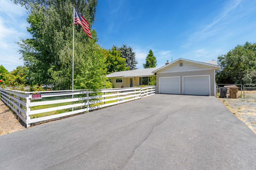 Charming Home on Rare .49-Acre Lot - Country Feel, Close to Town!
This 3-bedroom, 2-bath, 1,380 sq ft single-family home offers the best of both worlds—peaceful country-style living just minutes from town. Situated on a hard-to-find 0.49-acre lot in an established Grants Pass neighborhood, this property features a private well and septic, new flooring, kitchen upgrades, multiple outbuildings, and a covered back patio perfect for relaxing or entertaining. Enjoy space, privacy, and convenience all in one!