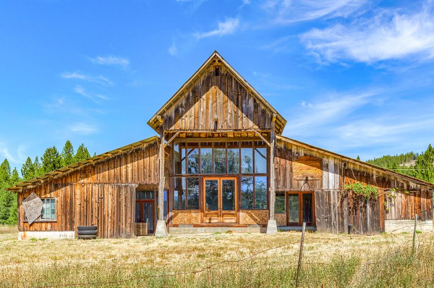 Experience the grandeur of rural living with this stunning 80-acre property, boasting a majestic 4200+ square foot barn. This expansive land offers a flat topography, perfect for various agricultural pursuits or equestrian activities. The fertile soil is a gardener's dream, offering endless opportunities for organic farming or vineyard establishment. The barn, a testament to timeless craftsmanship, provides ample space for storage, a large shop, livestock, tasting room, or could be transformed into a unique living space. The property is a rare find, offering the tranquility of country living with vast potential for your agricultural dreams. This property includes 2 tax lots, tax lot #1101 provides the barn w/1958 sq ft of living space and a work shed on 39.54 acres. The 2nd lot #200 has 40 acres with some timber and a seasonal creek, perfect for a 2nd home site! Don't miss the chance to own this piece of rural paradise.