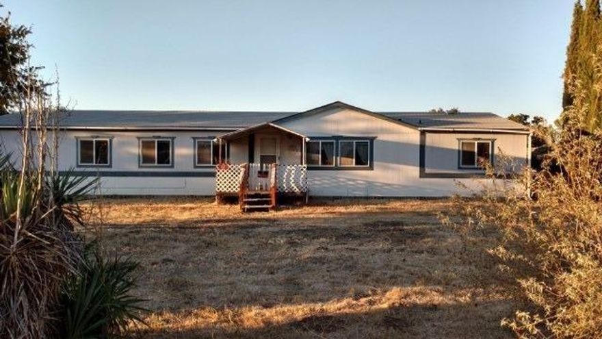What an amazing opportunity to live so close to town, but have room for all your toys and gear! Nicely cared for manufactured home on it's own land near Sams Valley and Central Point. 4 bed with a split floor plan, 2 bath and a 2 car garage all at an amazing price!