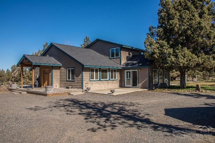 Exclusive horse property on 5.56 acres in Redmond. No climb pole fencing, arena w/sand footing. 3 stall barn and tack shed all near BLM & horse trails. Exquisitely remodeled 3067 sqft home w/granite slab counter tops, stainless steel appliances, tile floors, 4 beds, 2 baths. Master bdrm is on main level w/master bath jacuzzi tub & walk in closet. Property also includes 2 car garage, 24x22' shop, RV area w/hook ups and a patio that peaks at Smith Rock.