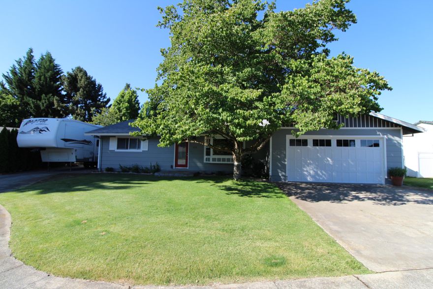 Welcome home! This beautiful 3/2 house is immaculate through and through. You will love the details that went into making this the diamond that it is! Recent updates include: New exterior paint, new bay windows, new garage doors, all new landscaping, new downspouts, new French-drain lines and a smart Nest thermostat. The Kitchen beams with character and is ready for entertaining! It features a large island, a farmhouse sink, built-in wine rack, ss appliances, built-in pantry with a sliding barn door and the cutest corner fireplace. The master bedroom, guestroom and large bathroom with a double vanity and built-ins, occupy one side of the house; while the laundry, second bath and third guest room sit past the garage allowing privacy for guests. Enjoy the labor and love that went into making the backyard a peaceful retreat; new paver patio, a new lawn, raised garden beds, smart wifi irrigation, a second garage+workbench and RV parking with hookups. Come fall in love with your new home!!