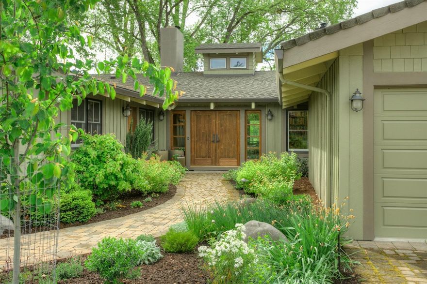 Gorgeous Rogue River front home offers privacy in an exclusive area of homes, ranches & wineries. Fish salmon, steelhead or trout; raise horses; entertain in style - it's all possible on this hard to find property. Single level home architecturally remodeled in 03. Level, fully irr 8+ ac; 300 ft of river frontage land & fence x fenced + lrg shop, organic kitchen garden, hobby greenhouse, chicken coop, fruit trees & herb garden right outside your door! Expansive views of the river & park-like lawns from Master, main living rooms & decks. Absolute dream kitchen for cooks & entertainers alike, featuring top-end appliances, soap stone counters, copper range hood, large island & wood fired pizza oven. Hickory wood floors, custom solid doors/moldings & Venetian plaster give the house a warm, unified sensibility . 3BR, 3BA, fireplace, large office/den , 3 car garage . Close to town, airport & still private & tranquil. Located in the center of world class fisheries & white water rafting.