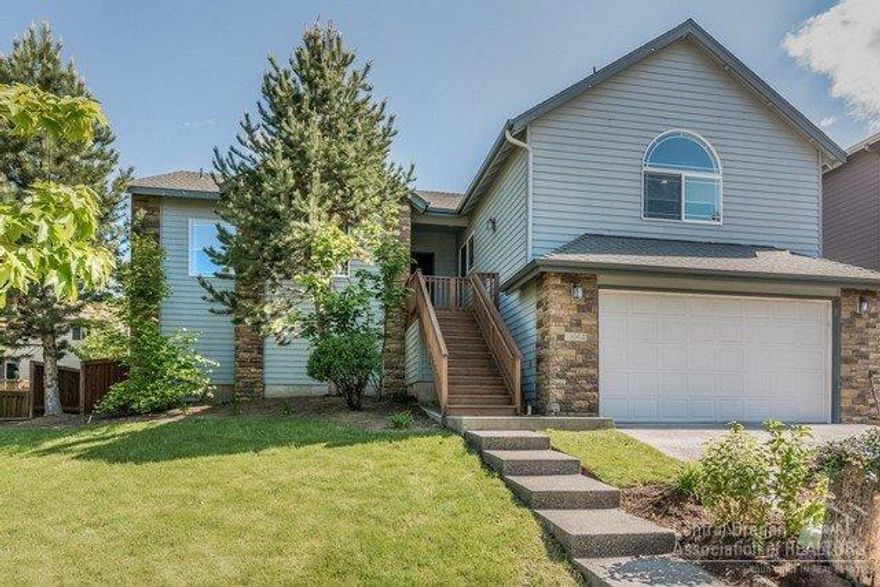 Enter this bright, open 1-level home into the spacious great room with vaulted ceilings & even space for your grand piano or pool table. You will love the extra large kitchen with serving bar, breakfast area & large pantry. New microwave & stove/oven. Set above the street, enjoy the views, privacy & security. Professionally terraced & landscaped private back yard with large decks. 592 sq ft lower level partially finished with two rooms & an open area great for storage, gym or office.