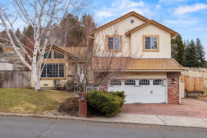 Very clean, exceptional turn key property in a great area! Not far from campus, the hospital, hiking, and more! The backyard is fully fenced and has an amphitheater feel and look. The driveway also allows for RV or additional vehicle parking. Exterior is stucco, with a Spanish style tile roof. The interior is tastefully decorated and has been updated with LVP flooring, and interior touch up painting. There is a half bath on the main level. There are two separate living rooms, and all bedrooms are on the same level. New HVAC system installed, including air ducts in 2022. New water heater installed in 2021. All appliances stay! Schedule your showing today before this one is gone..