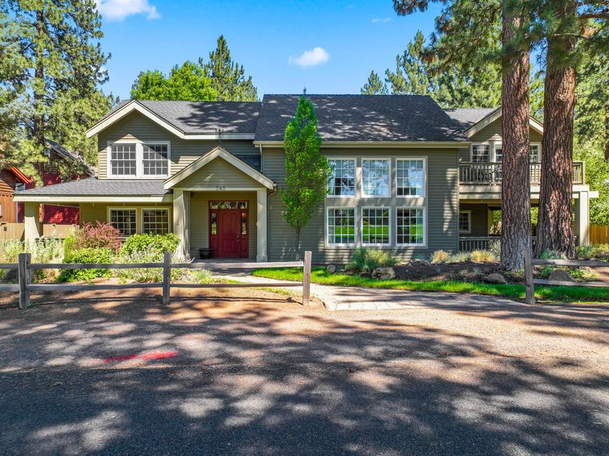 Incredible opportunity to restore a gracious, stately home with mountain views and adjacent protected green space. Featuring soaring two-story ceilings, a dramatic wall of windows, and propane fireplace in the great room. The study with Hearthstone fireplace and private balcony is a standout. The kitchen offers high-end cabinetry, 5-burner propane cooktop and a spacious butler's pantry—ready for updates to become a true chef's space. Wood floors throughout offer a solid foundation for cosmetic improvements. Oversized 696 SF garage, RV parking, and fully fenced .30-acre lot with mature landscaping, water feature, and large deck waiting to be revitalized. Bonus 14x16 greenhouse or studio for gardening or creative projects. Bring your vision—this home is full of potential!