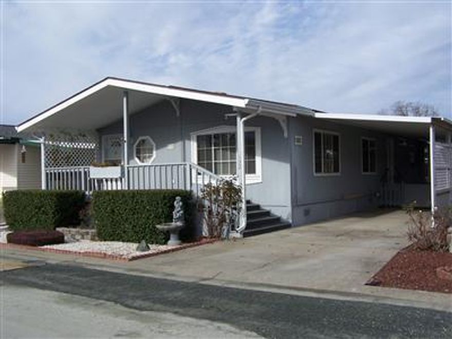 Nice 1990 MFH in Westlake Village Estates 55+ park. *Appliances that stay are: Range/oven, Frig, D/W, Washer/Dryer & garbage disposal. Kitchen was recently painted. Heat pump and furnace installed in 2007. New skylite in kitchen installed this year, 5x11 walk-in closet, 3-car carport, previous owners fenced part of it for pet but it can be put back as 3 car carport. 8x10 shed, fenced garden area in backyd. Nice size porch in front and water fountain stays.